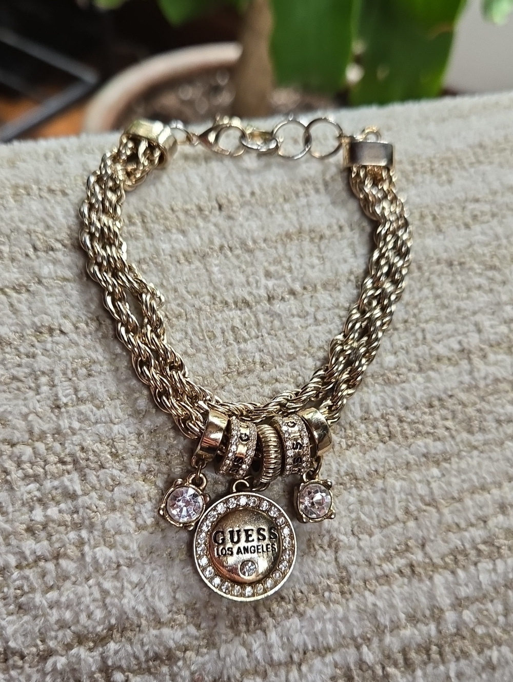 GUESS Gold-Tone Multi-Strand Charm Bracelet with Crystal Accents